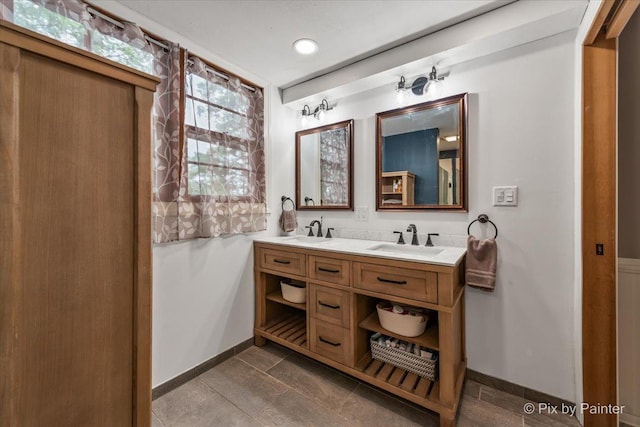8920 Mcvicker Ave, Morton Grove, IL 60053 - full bath featuring double vanity and baseboards