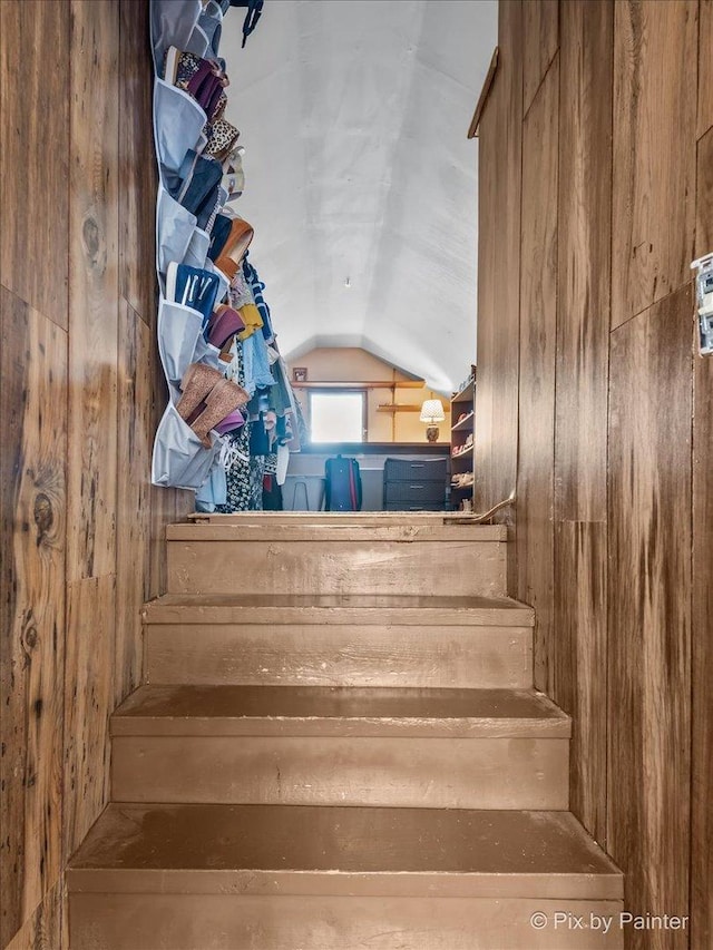 8920 Mcvicker Ave, Morton Grove, IL 60053 - staircase featuring wood walls and lofted ceiling