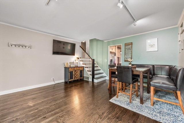 8920 Mcvicker Ave, Morton Grove, IL 60053 - dining area with track lighting, stairs, ornamental molding, and wood finished floors