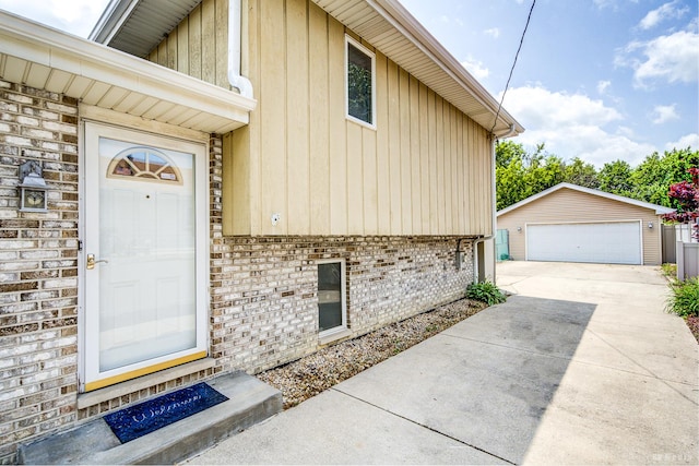 14224 Karlov Ave, Crestwood, IL 60418 - doorway to property featuring brick siding and a detached garage