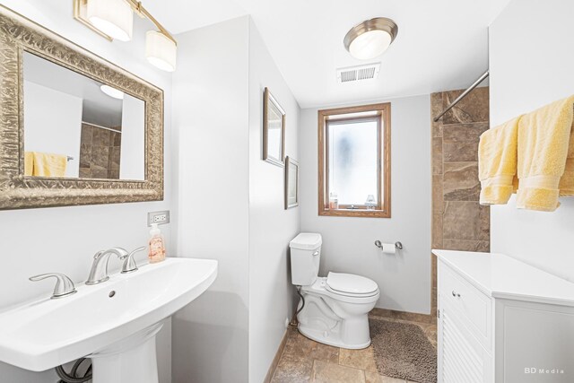 14224 Karlov Ave, Crestwood, IL 60418 - bathroom featuring baseboards and tiled shower