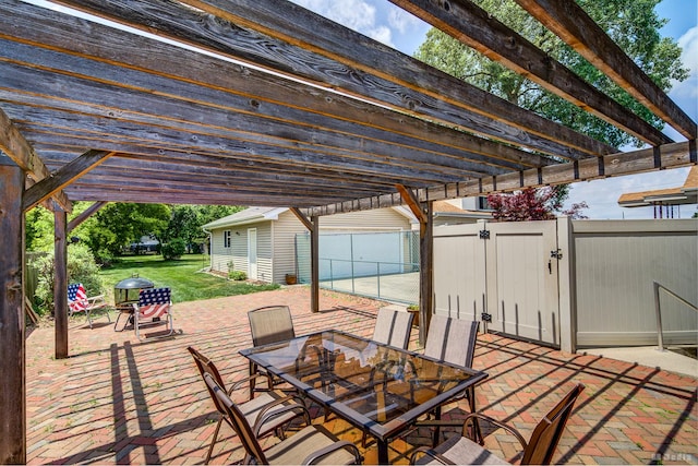 14224 Karlov Ave, Crestwood, IL 60418 - view of patio with outdoor dining area, a gate, a pergola, and an outbuilding