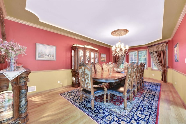 22450 Autumn Dr, Frankfort, IL 60423 - dining room with a chandelier, wood finished floors, and ornamental molding