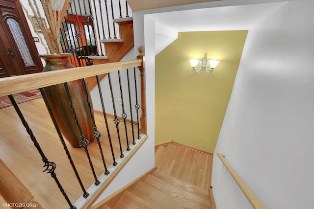 22450 Autumn Dr, Frankfort, IL 60423 - stairway featuring wood finished floors and baseboards