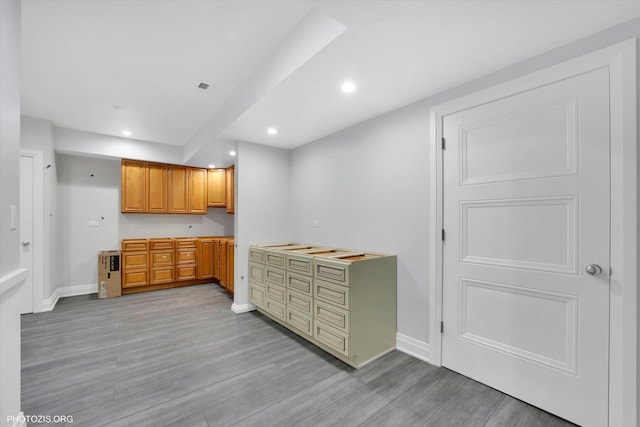 22450 Autumn Dr, Frankfort, IL 60423 - kitchen with light wood-type flooring, recessed lighting, and brown cabinetry