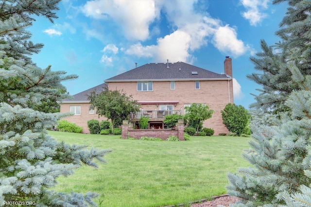 22450 Autumn Dr, Frankfort, IL 60423 - rear view of house with a chimney, a yard, and a wooden deck