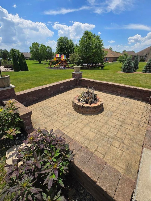 22450 Autumn Dr, Frankfort, IL 60423 - view of patio featuring a playground and an outdoor fire pit