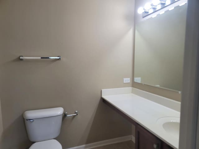 3144 Taunton St Unit 3144, Elgin, IL 60124 - half bath featuring vanity and toilet