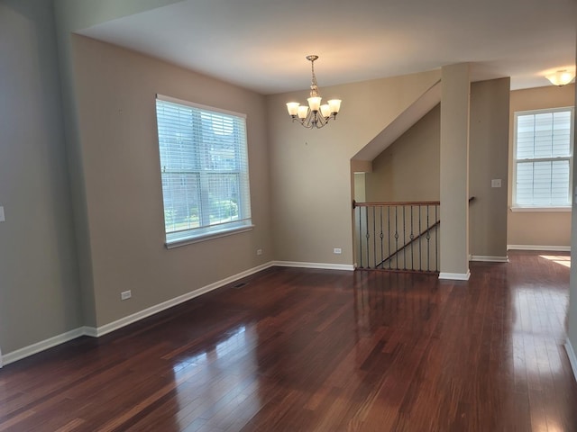 3144 Taunton St Unit 3144, Elgin, IL 60124 - spare room featuring a chandelier and hardwood / wood-style floors
