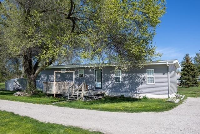 6102 E Hillside Rd, Crystal Lake, IL 60012 - single story home with a deck and a front yard