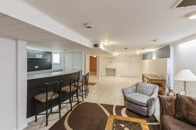 7350 Lavergne Ave, Skokie, IL 60077 - living room featuring a bar and light tile patterned flooring