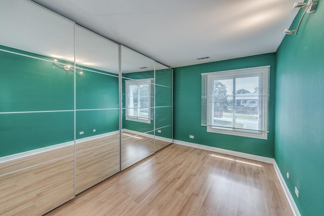4524 Kings Walk Dr Unit 2A, Rolling Meadows, IL 60008 - unfurnished bedroom featuring wood finished floors