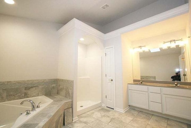 8301 Dylan Dr, Merrillville, IN 46410 - bathroom featuring a bath, vanity, tile patterned flooring, and recessed lighting