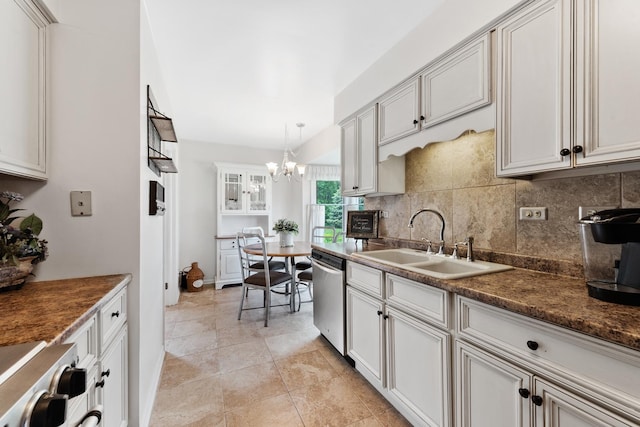 2S570 Patrick Henry Sq Unit 119, Oak Brook, IL 60523 - kitchen featuring stainless steel dishwasher, a chandelier, backsplash, stove, and dark countertops