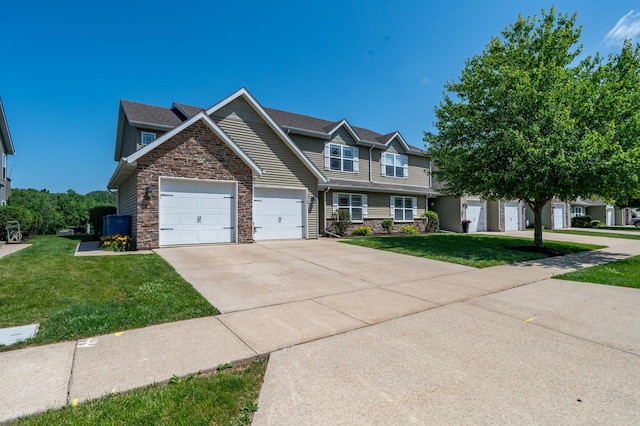 1715 W River St Unit 1715, Dixon, IL 61021 - view of front of home with stone siding, an attached garage, concrete driveway, and a front yard