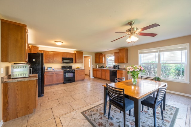 1715 W River St Unit 1715, Dixon, IL 61021 - dining area featuring a ceiling fan and light tile patterned floors