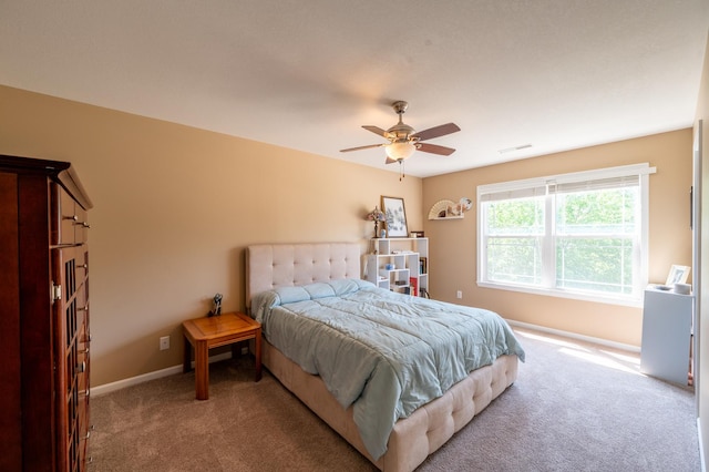 1715 W River St Unit 1715, Dixon, IL 61021 - carpeted bedroom featuring baseboards and ceiling fan