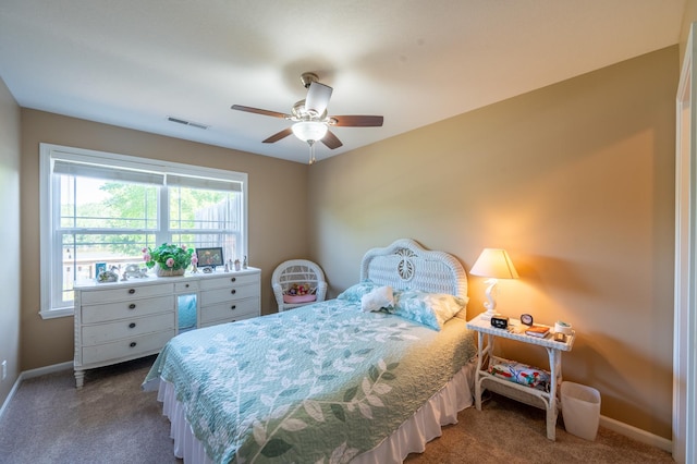 1715 W River St Unit 1715, Dixon, IL 61021 - carpeted bedroom with baseboards and a ceiling fan