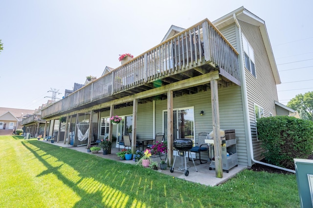 1715 W River St Unit 1715, Dixon, IL 61021 - rear view of property featuring a yard, a wooden deck, and a patio area