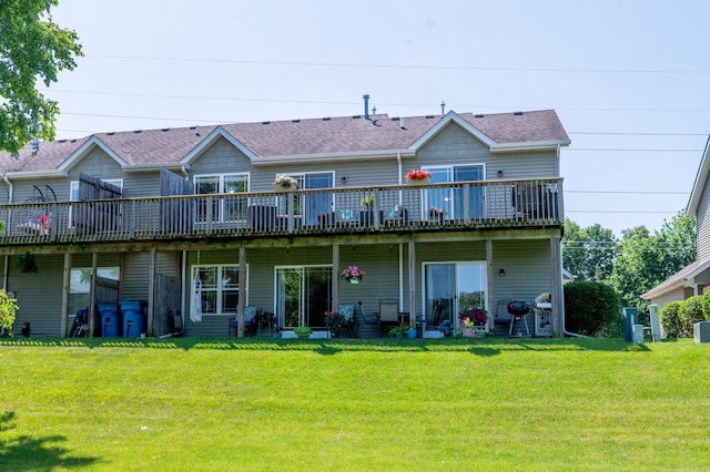 1715 W River St Unit 1715, Dixon, IL 61021 - back of house featuring a wooden deck, a yard, and a shingled roof