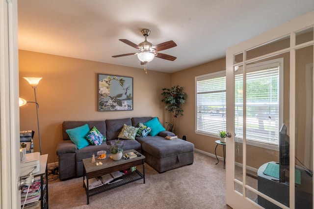 1715 W River St Unit 1715, Dixon, IL 61021 - living area featuring a ceiling fan and carpet