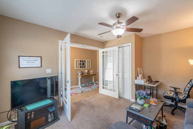 1715 W River St Unit 1715, Dixon, IL 61021 - living area featuring french doors, carpet flooring, ceiling fan, and a desk