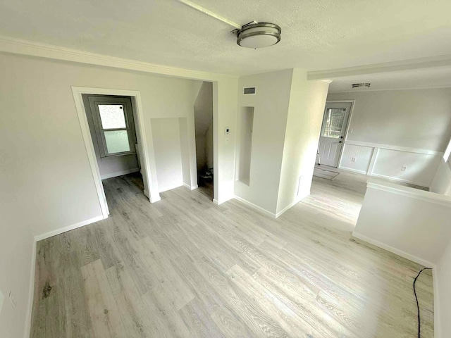 1356 Willard Ave, Rockford, IL 61101 - empty room featuring light wood-style flooring and a textured ceiling