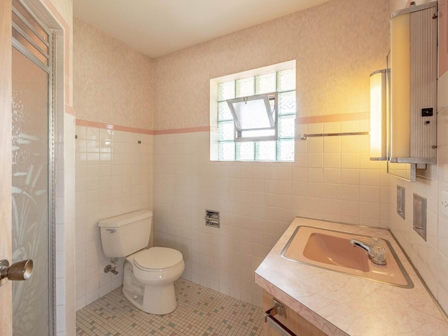 6052 W 128th St, Palos Heights, IL 60463 - full bathroom with tile walls, vanity, and tile patterned floors