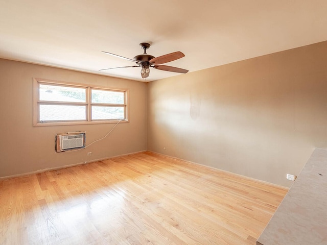 6052 W 128th St, Palos Heights, IL 60463 - empty room with a ceiling fan, light wood-type flooring, and a wall mounted air conditioner