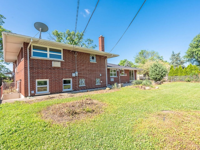 6052 W 128th St, Palos Heights, IL 60463 - rear view of property with a chimney and brick siding