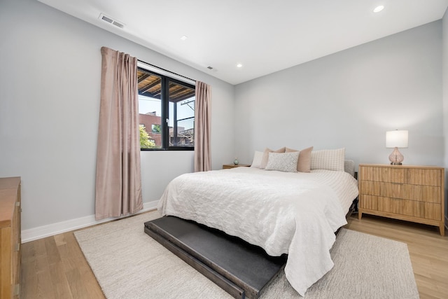 1011 N Winchester Ave Unit 2, Chicago, IL 60622 - bedroom with light wood-type flooring and recessed lighting