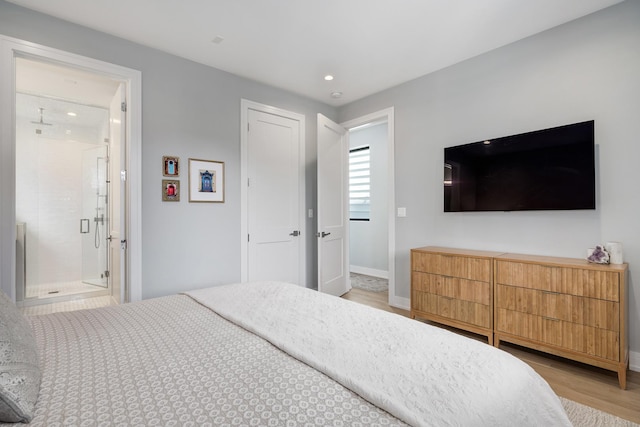 1011 N Winchester Ave Unit 2, Chicago, IL 60622 - bedroom featuring light wood-type flooring, recessed lighting, and ensuite bathroom