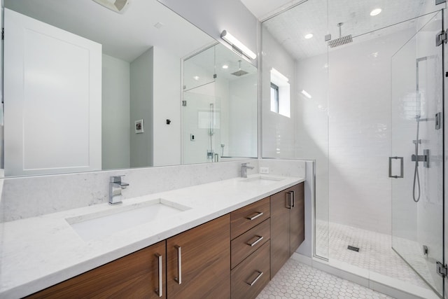 1011 N Winchester Ave Unit 2, Chicago, IL 60622 - full bathroom featuring a stall shower, double vanity, tile patterned floors, and recessed lighting
