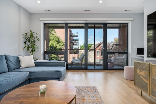 1011 N Winchester Ave Unit 2, Chicago, IL 60622 - living area with wood finished floors and recessed lighting