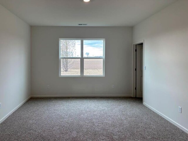 2281 Redwood Trl, Wonder Lake, IL 60097 - empty room featuring carpet flooring and baseboards