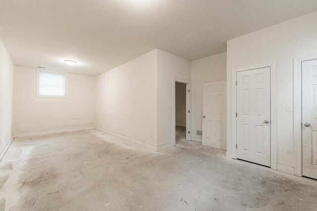 3723 N Nordica Ave, Chicago, IL 60634 - unfurnished bedroom featuring concrete flooring and baseboards