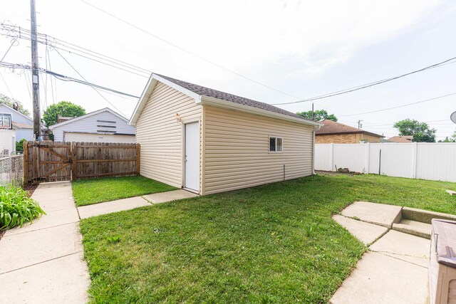 3723 N Nordica Ave, Chicago, IL 60634 - fenced backyard featuring an outbuilding, a garage, and a gate