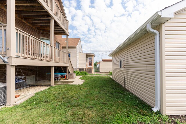 3723 N Nordica Ave, Chicago, IL 60634 - view of green lawn with a wooden deck