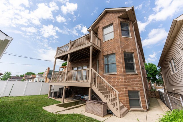 3723 N Nordica Ave, Chicago, IL 60634 - back of house featuring a fenced backyard, brick siding, a balcony, and stairs