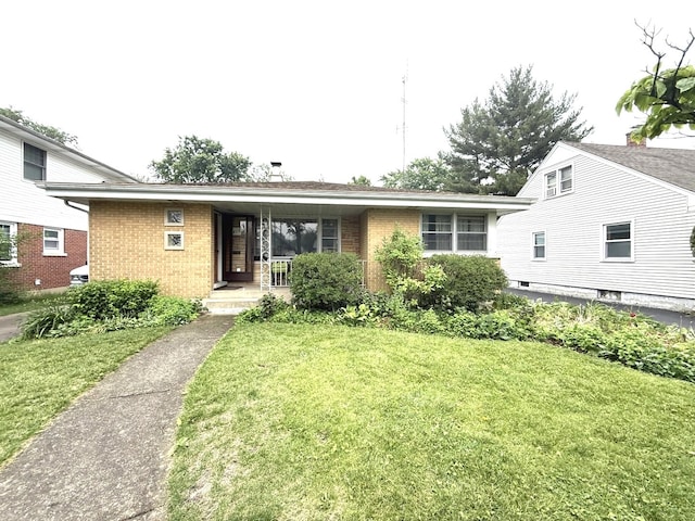 419 S Chase Ave, Lombard, IL 60148 - view of front of property featuring brick siding, a front yard, and covered porch