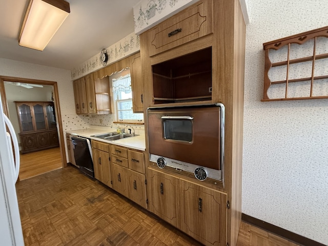 419 S Chase Ave, Lombard, IL 60148 - kitchen featuring wall oven, black dishwasher, freestanding refrigerator, light countertops, and wallpapered walls