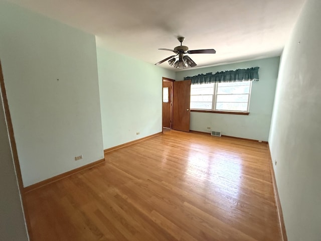 419 S Chase Ave, Lombard, IL 60148 - spare room with light wood-style floors and ceiling fan