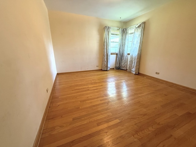 419 S Chase Ave, Lombard, IL 60148 - unfurnished room with light wood finished floors and baseboards