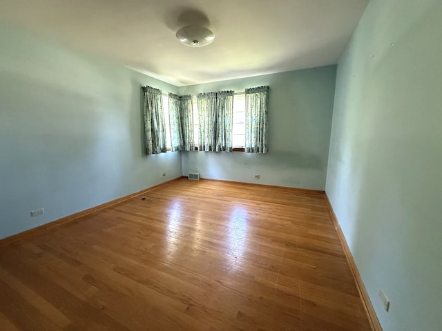 419 S Chase Ave, Lombard, IL 60148 - unfurnished room with wood finished floors and baseboards