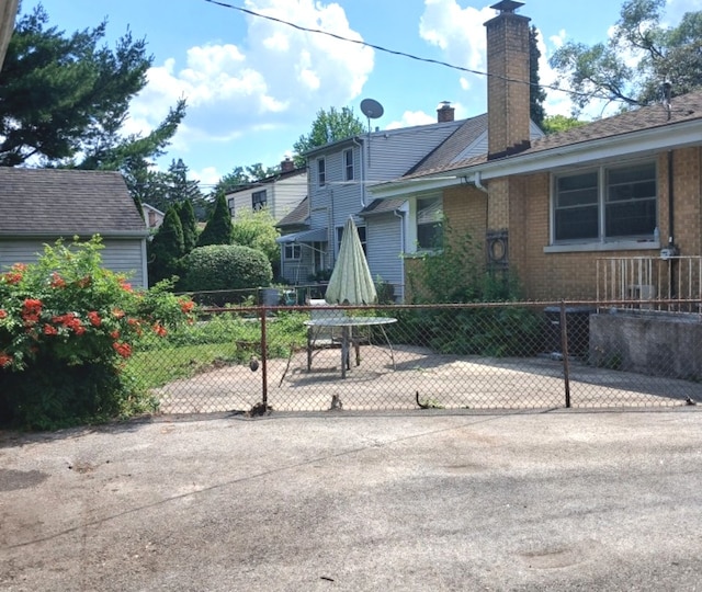 419 S Chase Ave, Lombard, IL 60148 - view of front of house featuring a chimney and brick siding