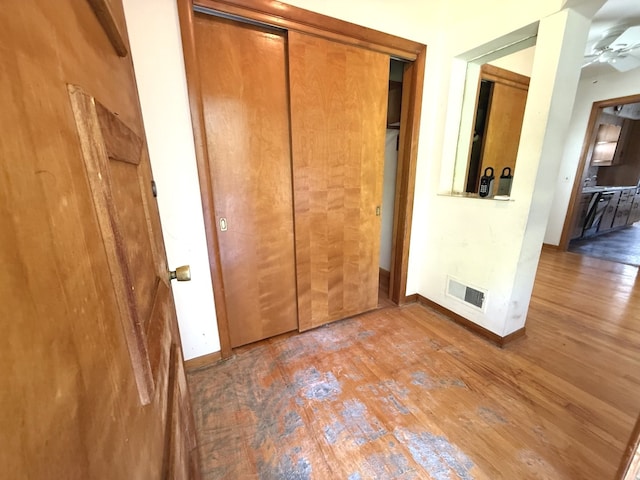 419 S Chase Ave, Lombard, IL 60148 - unfurnished bedroom featuring wood finished floors and a closet