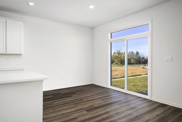 15063 W Oxford Ln, Manhattan, IL 60442 - unfurnished dining area featuring dark wood-style floors and recessed lighting