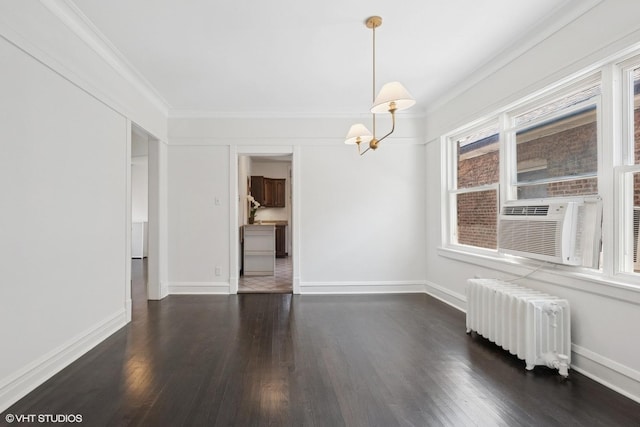 5943 N Talman Ave, Chicago, IL 60659 - spare room with radiator heating unit, wood finished floors, ornamental molding, and cooling unit