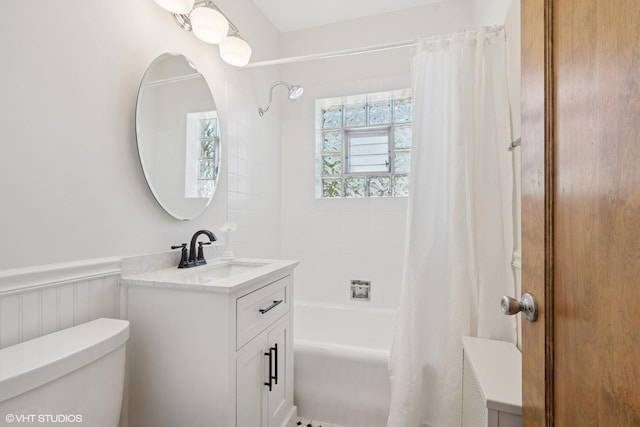 5943 N Talman Ave, Chicago, IL 60659 - bathroom featuring shower / tub combo with curtain, vanity, and a wainscoted wall
