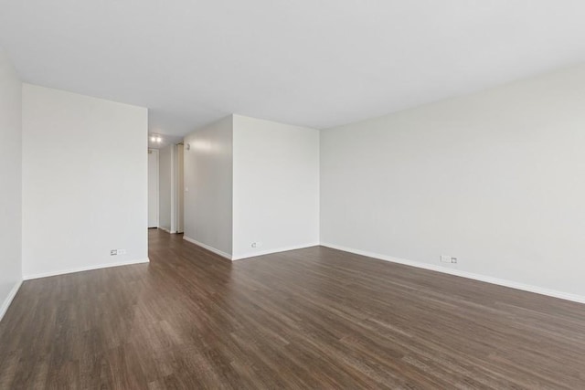 2650 N Lakeview Ave Unit 1603, Chicago, IL 60614 - spare room featuring dark wood-style floors and baseboards